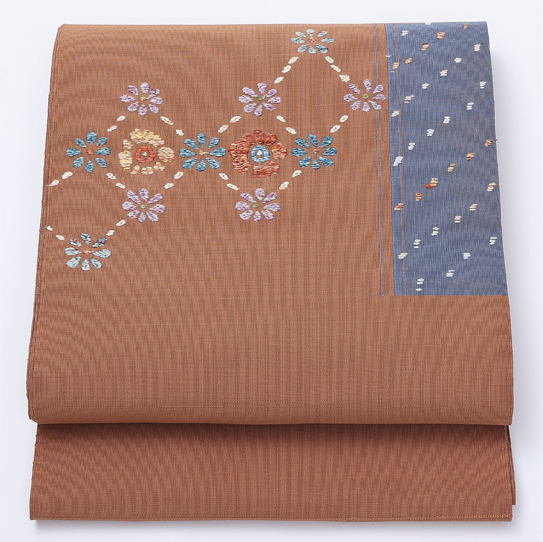 未使用品 名古屋帯 帯丈544cm ポイント柄 未仕立て Nランク カジュアル 刺繍 綴れ織 正絹 茶系 1224-01399