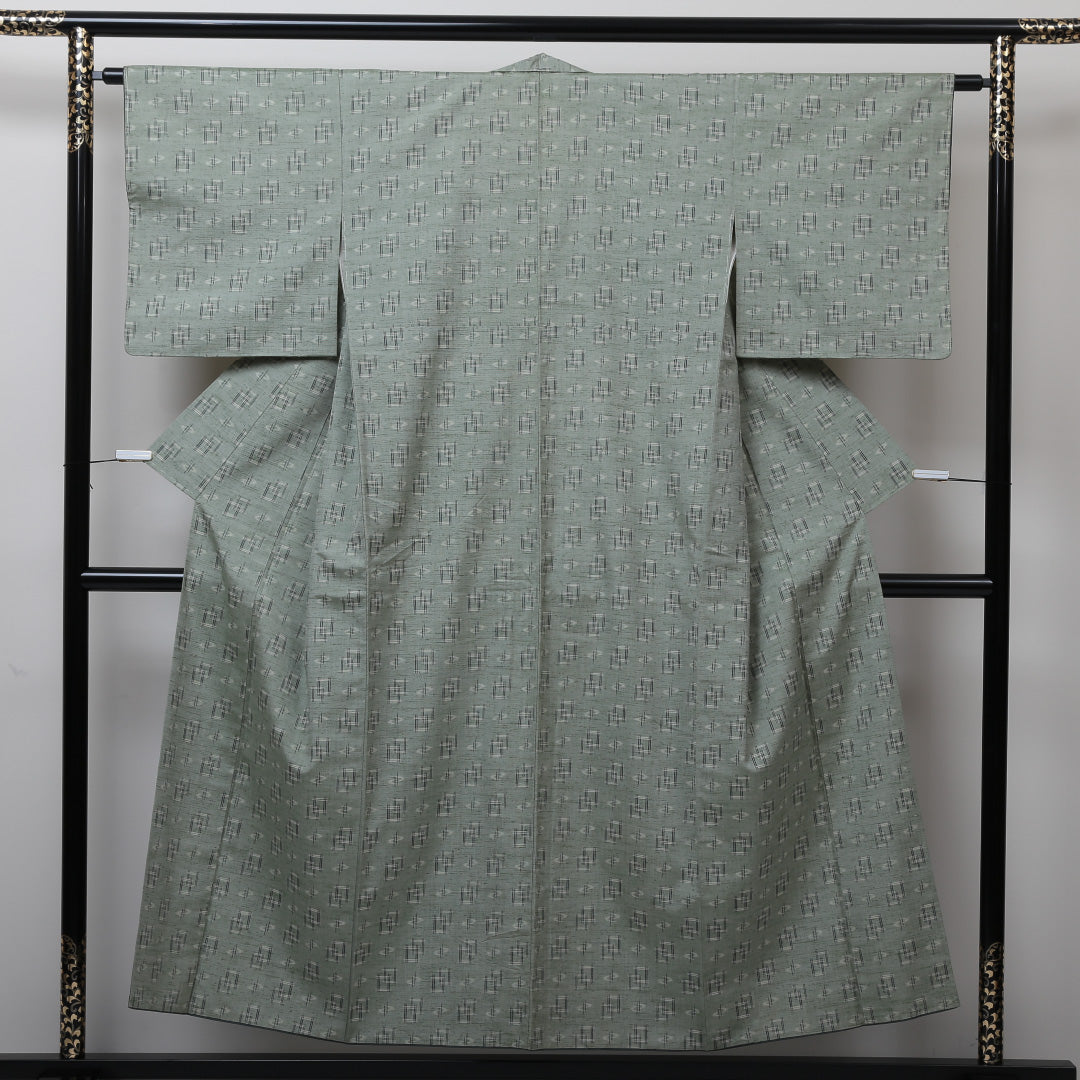 琉球絣の着物 袷 身丈151cm 裄丈62cm 正絹 Aランク カジュアル バチ衿 Sサイズ カキジュー カシ・マーシー 緑系 M4 1223-02913