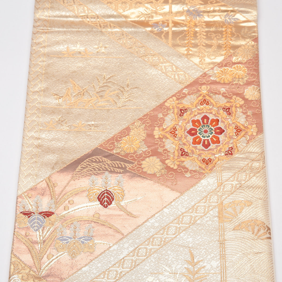 袋帯 帯丈424cm 正絹 六通 フォーマル 裂取り 宝相華 金系 ピンク系 1243-01187