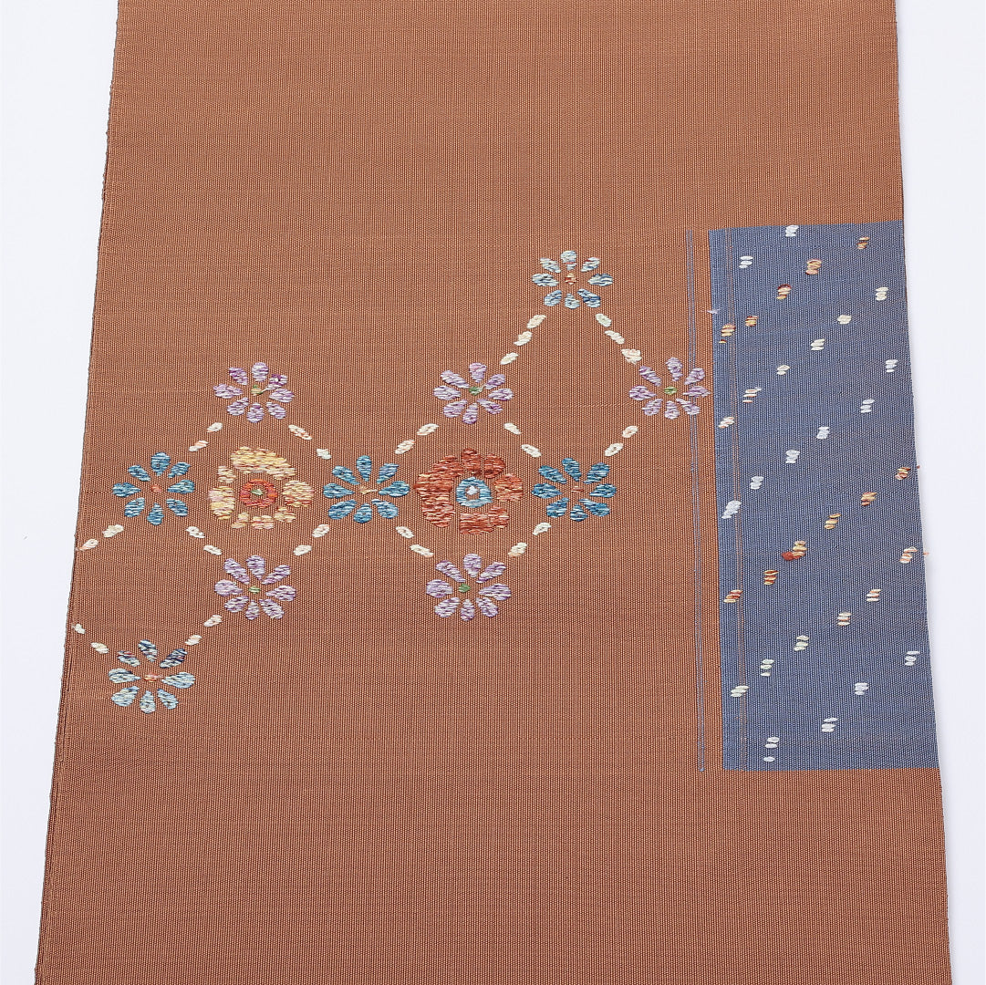 未使用品 名古屋帯 帯丈544cm ポイント柄 未仕立て Nランク カジュアル 刺繍 綴れ織 正絹 茶系 1224-01399