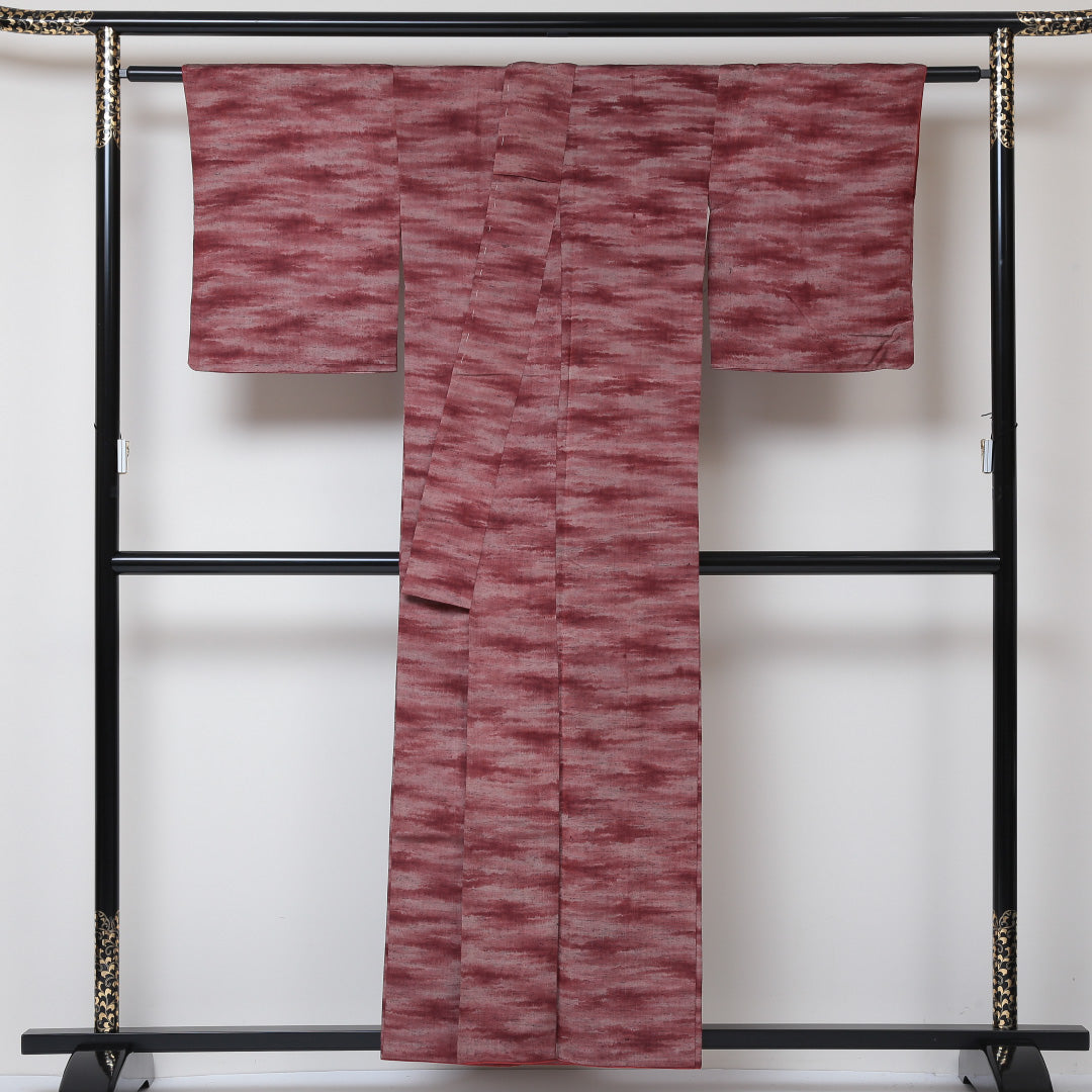真綿紬 袷 身丈155cm 裄丈63cm 正絹 Aランク カジュアル 広衿 Mサイズ 抽象柄 赤系 RP 1223-03047