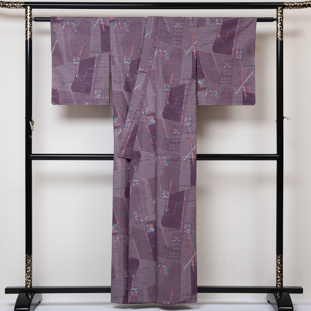 未使用品 紬 単衣 身丈158cm 裄丈63cm 正絹 Sランク Mサイズ バチ衿 カジュアル 寄せ柄 しつけ糸 紫系 1216-02978