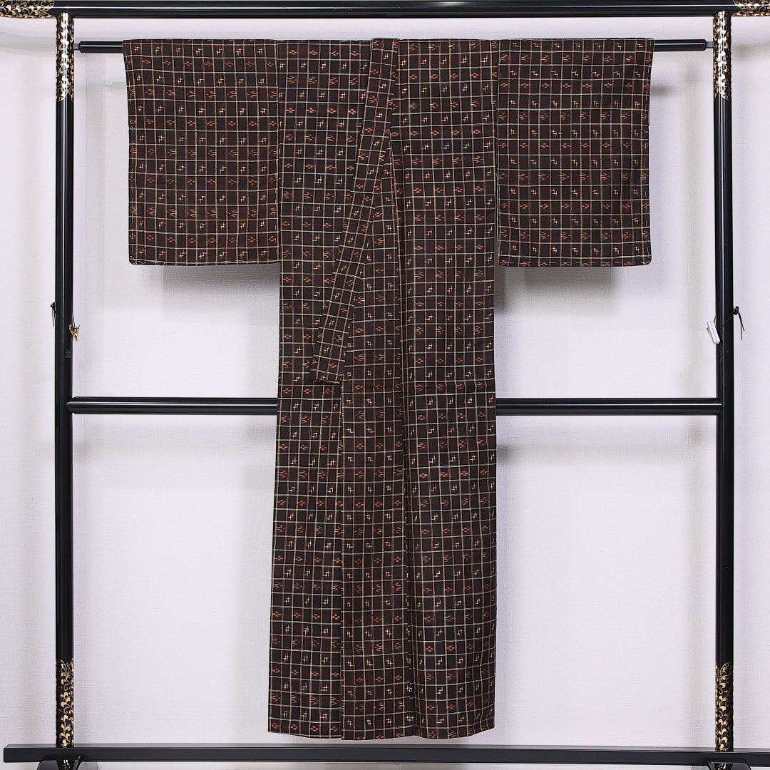 琉球絣の着物 袷 身丈148cm 裄丈62cm 正絹 Sランク カジュアル バチ衿 XSサイズ トゥイグァー 茶系 PO 1223-10844