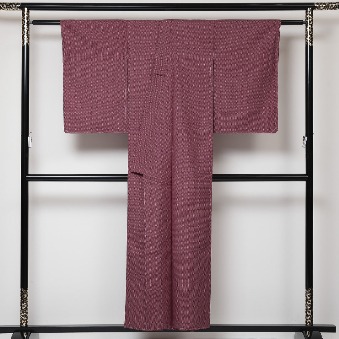 未使用品 紬 袷 身丈152cm 裄丈62cm 正絹 Sランク カジュアル バチ衿 Sサイズ しつけ糸 蚊絣 赤系 RP 1223-03073