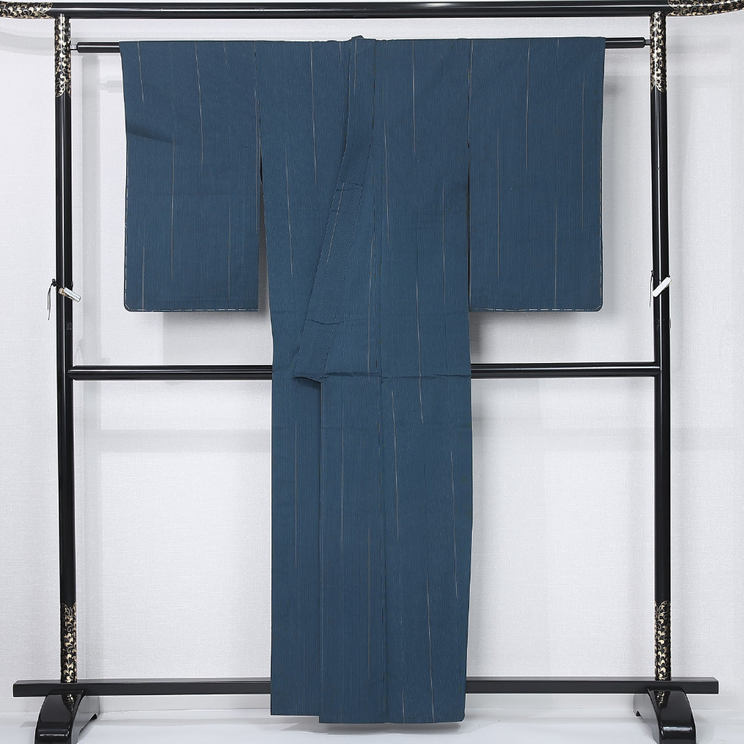 未使用品 紬 単衣 身丈158cm 裄丈61cm 正絹 Nランク カジュアル バチ衿 Mサイズ 漆糸 しつけ糸 抽象柄 緑系 M4 1223-12297