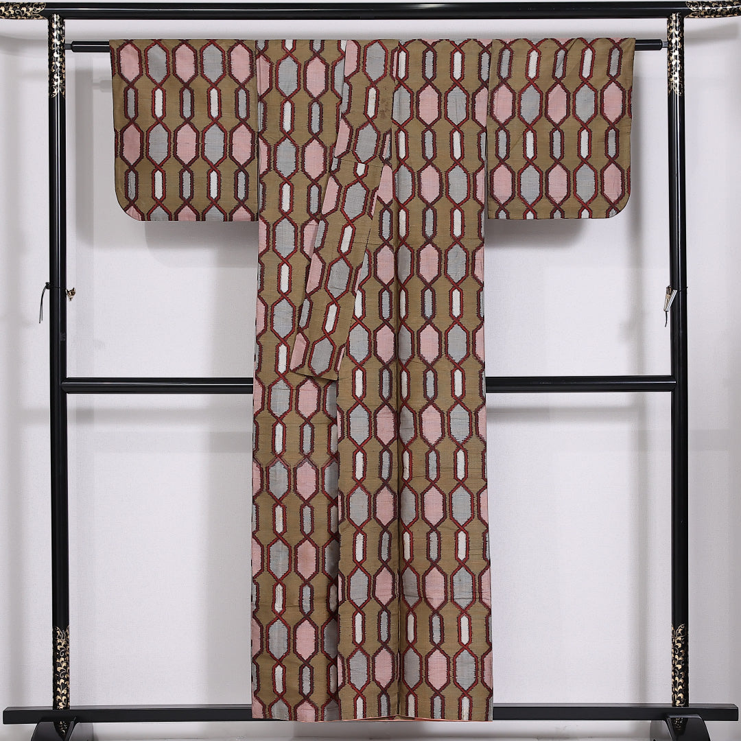アンティーク 銘仙 紬 袷 身丈153cm 裄62.5cm 正絹 亀甲 茶系 Cランク 1216-01434