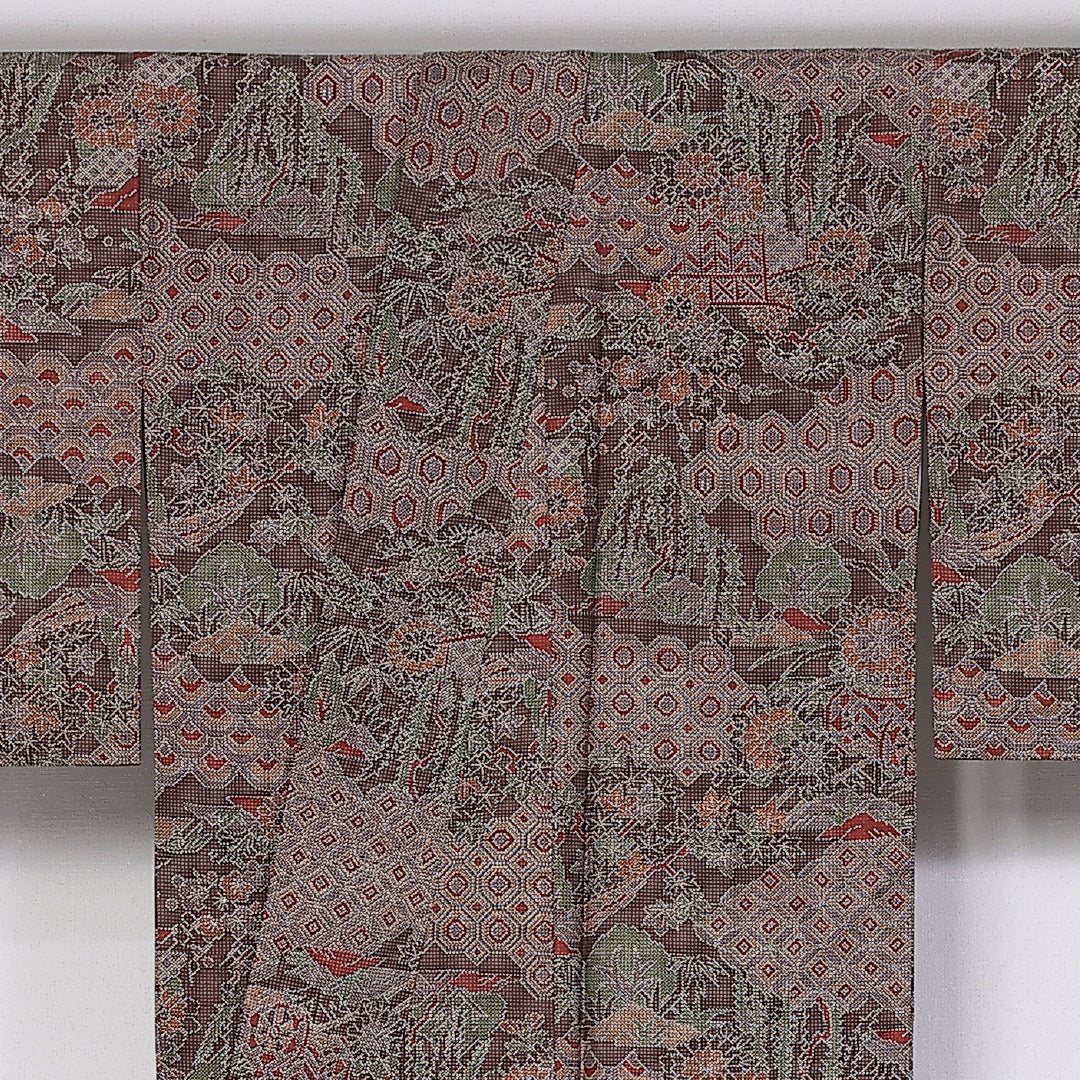 大島紬 袷 身丈165cm 裄63.5cm 正絹 吉祥文様 菊 茶系 Aランク 1216-01408