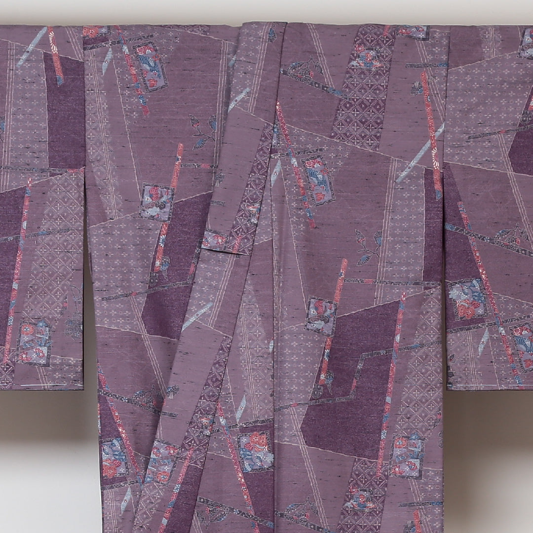 未使用品 紬 単衣 身丈158cm 裄丈63cm 正絹 Sランク Mサイズ バチ衿 カジュアル 寄せ柄 しつけ糸 紫系 1216-02978