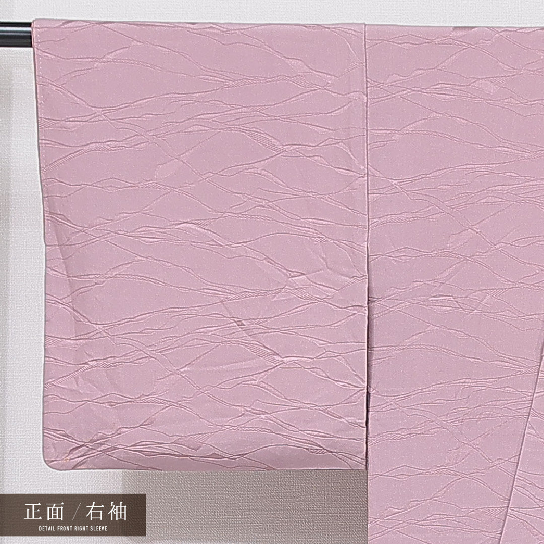 色無地 袷 身丈157cm 裄丈63cm 正絹 Bランク Mサイズ バチ衿 一つ紋(三つ割桔梗) セミフォーマル 紋意匠 創作柄 織り出し ピンク系 1214-15648