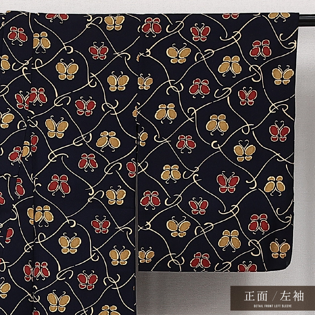 洗える着物 ウールの紬 単衣 身丈153cm 裄丈62cm ウール Sランク カジュアル バチ衿 Sサイズ 蝶 紺系 RP 1223-14176