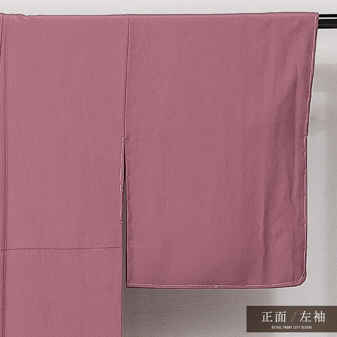 未使用品 色無地 袷 身丈154cm 裄丈62cm 正絹 Sランク 一つ紋 (丸に四つ剣片喰) セミフォーマル 広衿 Sサイズ ふくれ織 しつけ糸 ピンク系 RP 1219-14224