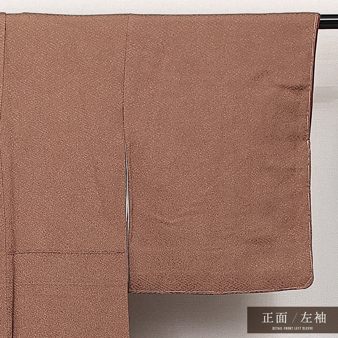未使用品 江戸小紋 (鮫) 袷 身丈156cm 裄丈64cm 正絹 Nランク 一つ紋 (五三桐) 紋意匠 (紗綾形) セミフォーマル 広衿 Mサイズ 伊勢型 型染め しつけ糸 茶系 M4 1220-14056