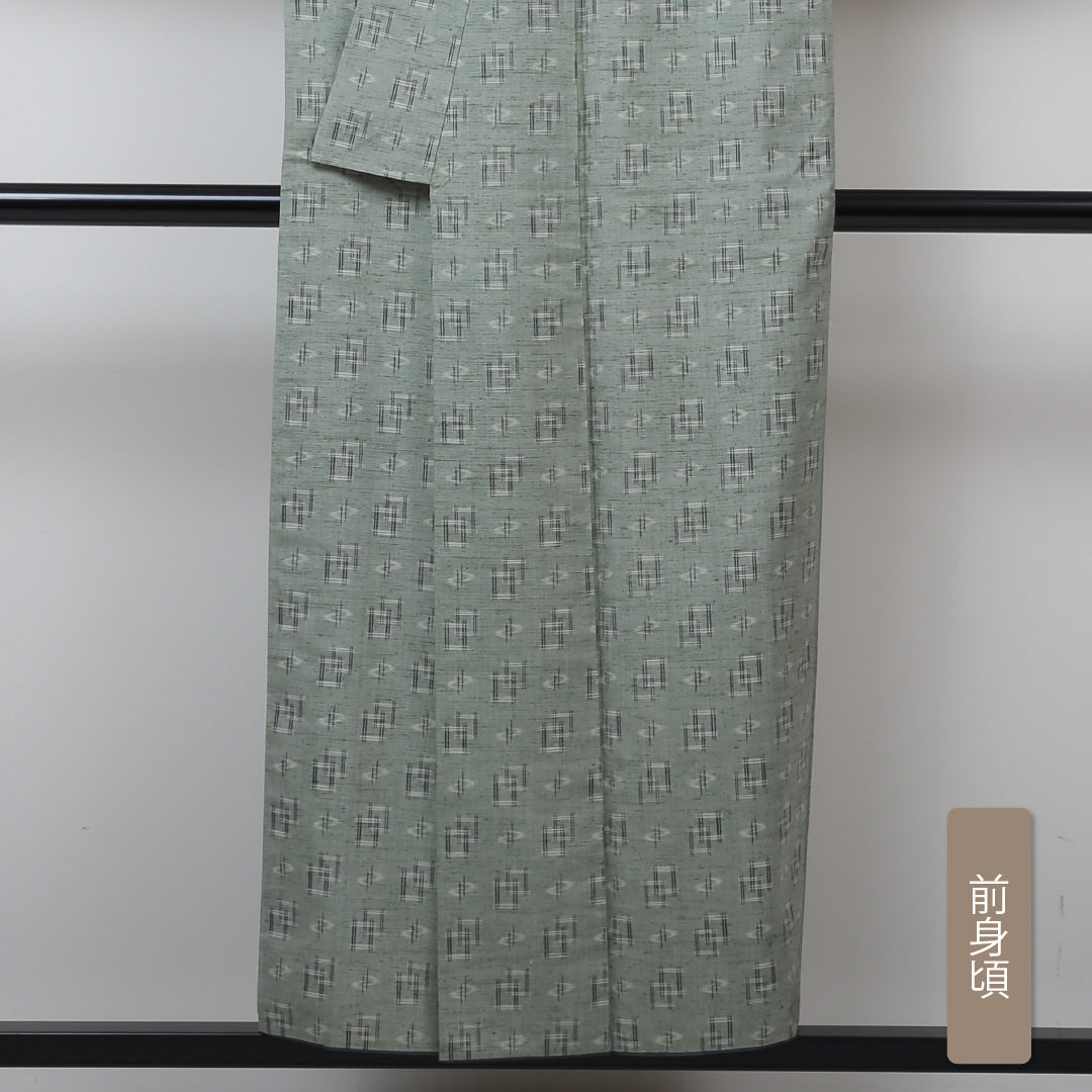 琉球絣の着物 袷 身丈151cm 裄丈62cm 正絹 Aランク カジュアル バチ衿 Sサイズ カキジュー カシ・マーシー 緑系 M4 1223-02913