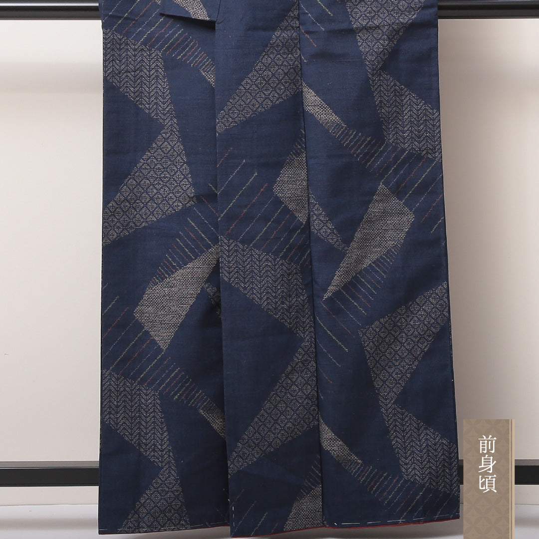 紬 袷 身丈161cm 裄丈66cm 正絹 Aランク カジュアル 広衿 Lサイズ しつけ糸 創作柄 紺系 HP 1223-03510