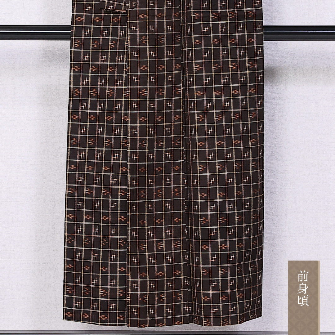 琉球絣の着物 袷 身丈148cm 裄丈62cm 正絹 Sランク カジュアル バチ衿 XSサイズ トゥイグァー 茶系 PO 1223-10844