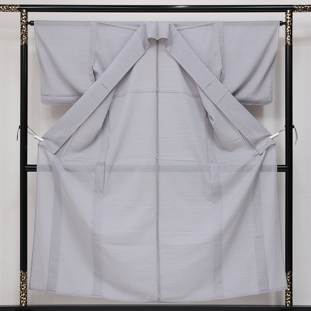 未使用品 色無地 絽 身丈156cm 裄丈62cm Nランク 正絹 広衿 Mサイズ 一つ紋 セミフォーマル 地紋なし しつけ糸 無地 上品 しとやか グレー系 1214-14383