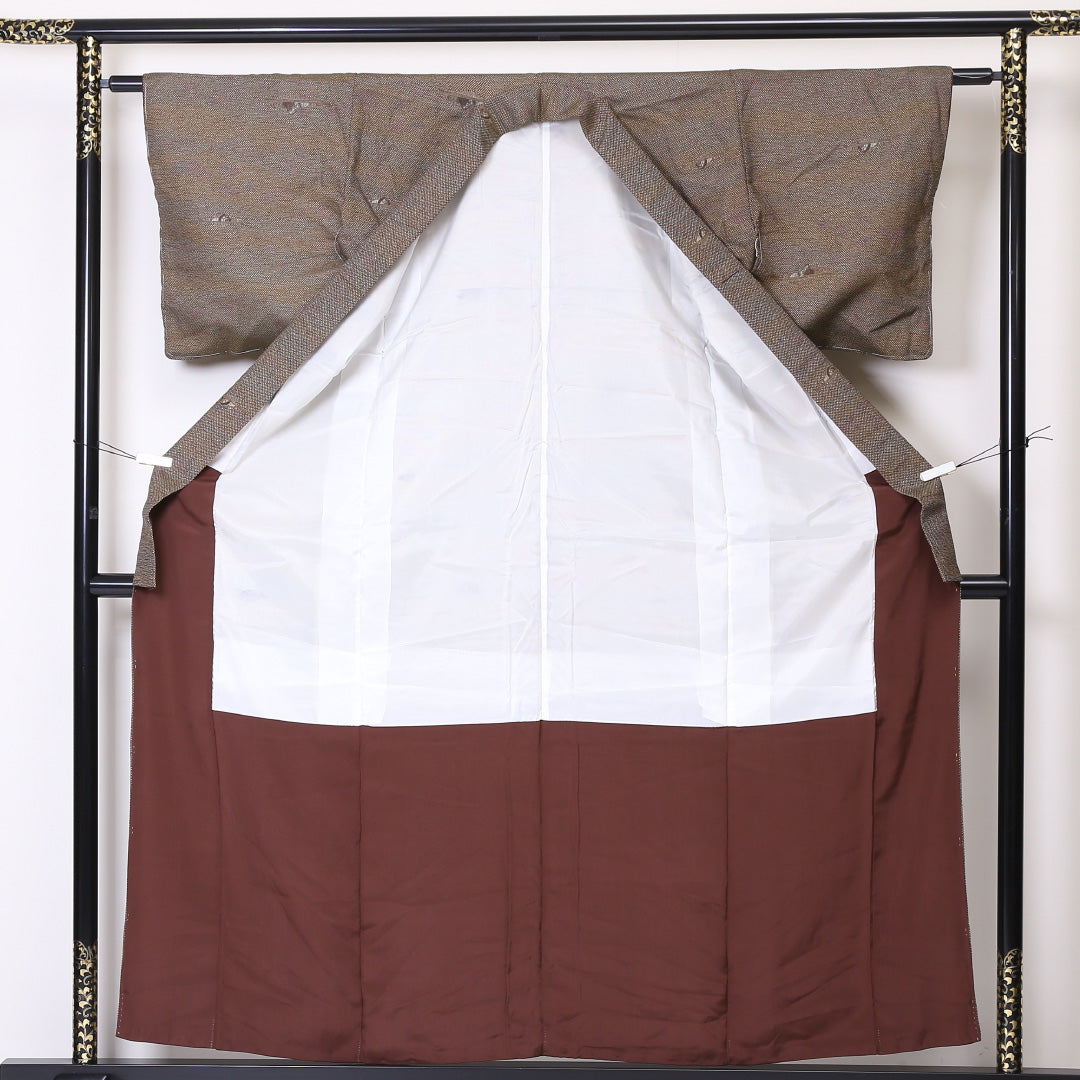 未使用品 真綿紬 袷 身丈157cm 裄丈61cm 正絹 Sランク カジュアル バチ衿 Mサイズ ぼかし染 しつけ糸 石庭 茶系 PO 1223-03286