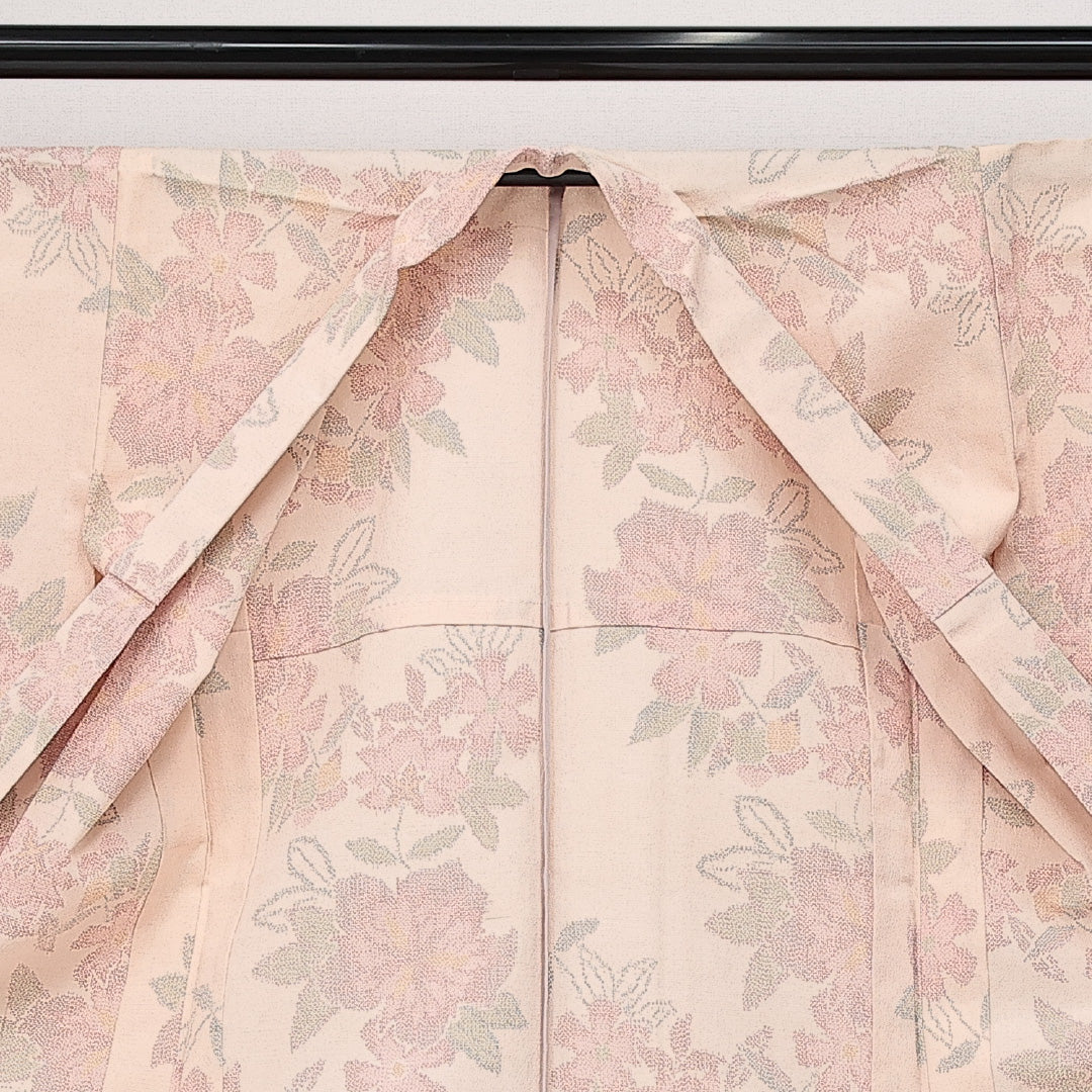 未使用品 紬 単衣 身丈161cm 裄丈62cm 正絹 Sランク カジュアル バチ衿 Lサイズ 織り出し しつけ糸 花柄 ピンク系 RP 1223-14317
