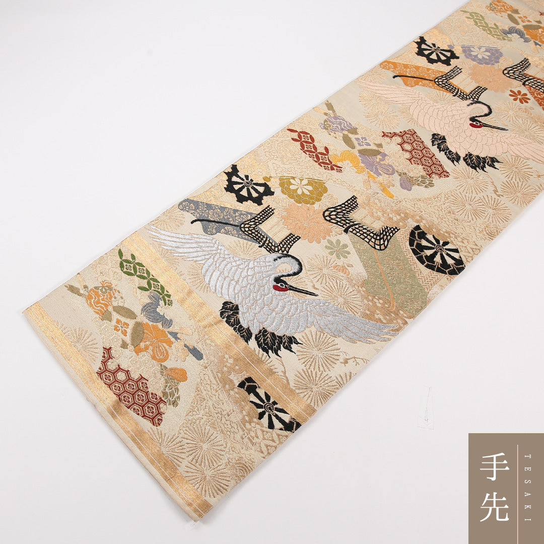 アンティーク 丸帯 帯丈392cm 正絹 全通 御所車 鶴 菊 クリーム系 1242-02569