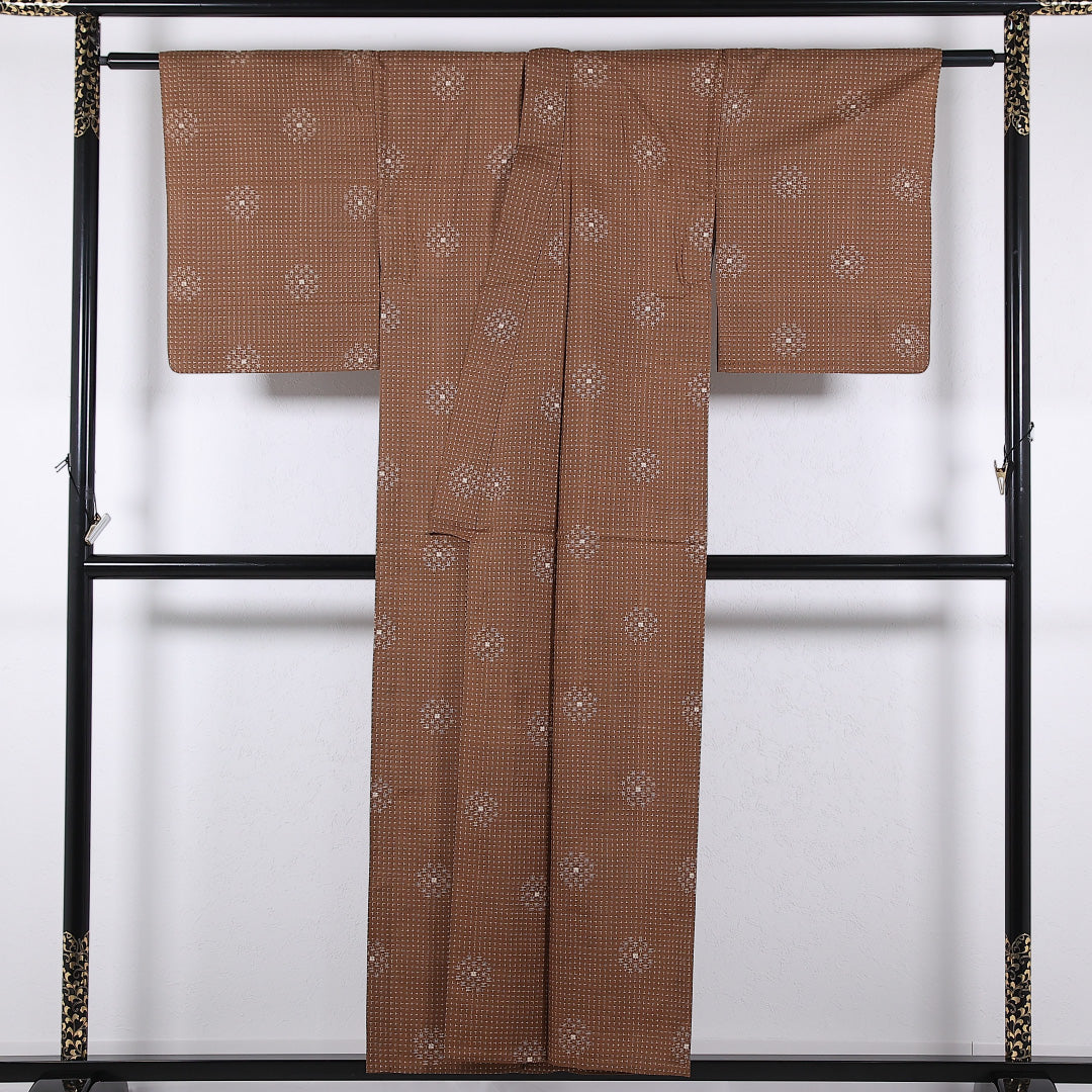 アンティーク 紬 単衣 身丈151cm 裄丈64cm 正絹 Bランク バチ衿 Sサイズ 居敷当て 肩当て 十字絣 茶系 RP 1223-17341