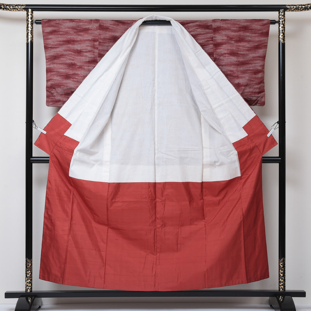 真綿紬 袷 身丈155cm 裄丈63cm 正絹 Aランク カジュアル 広衿 Mサイズ 抽象柄 赤系 RP 1223-03047