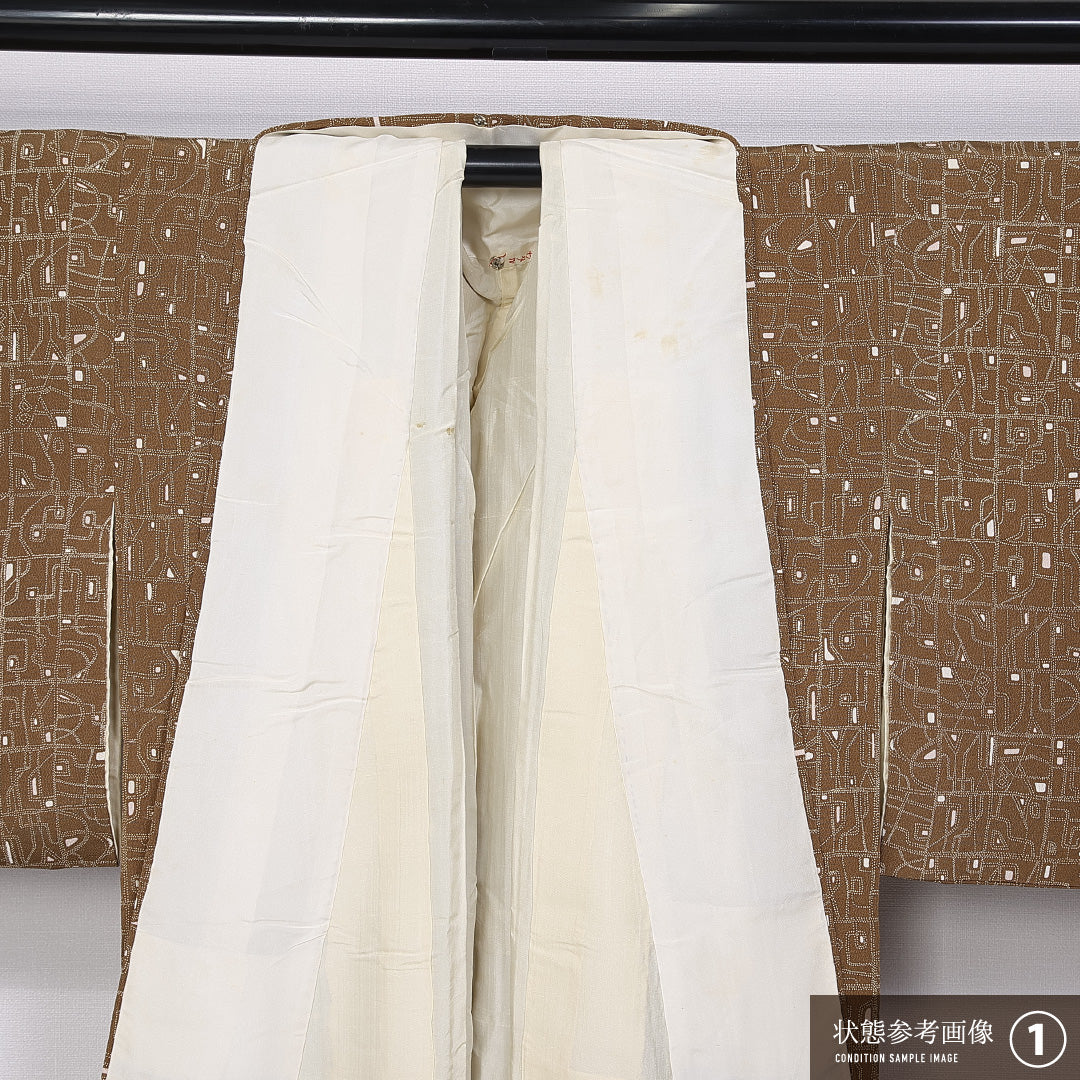 小紋 (ちりめん) 袷 身丈149cm 裄丈59cm 正絹 Aランク インフォーマル 広衿 XSサイズ 幾何学柄 ちりめん 茶系 RP 1221-11257