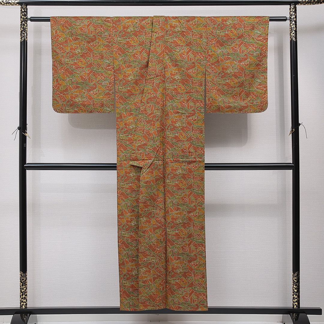 洗える着物 ウールの紬 単衣 身丈152cm 裄丈62cm ウール Sランク カジュアル バチ衿 Sサイズ 植物柄 茶系 RP 1223-15367