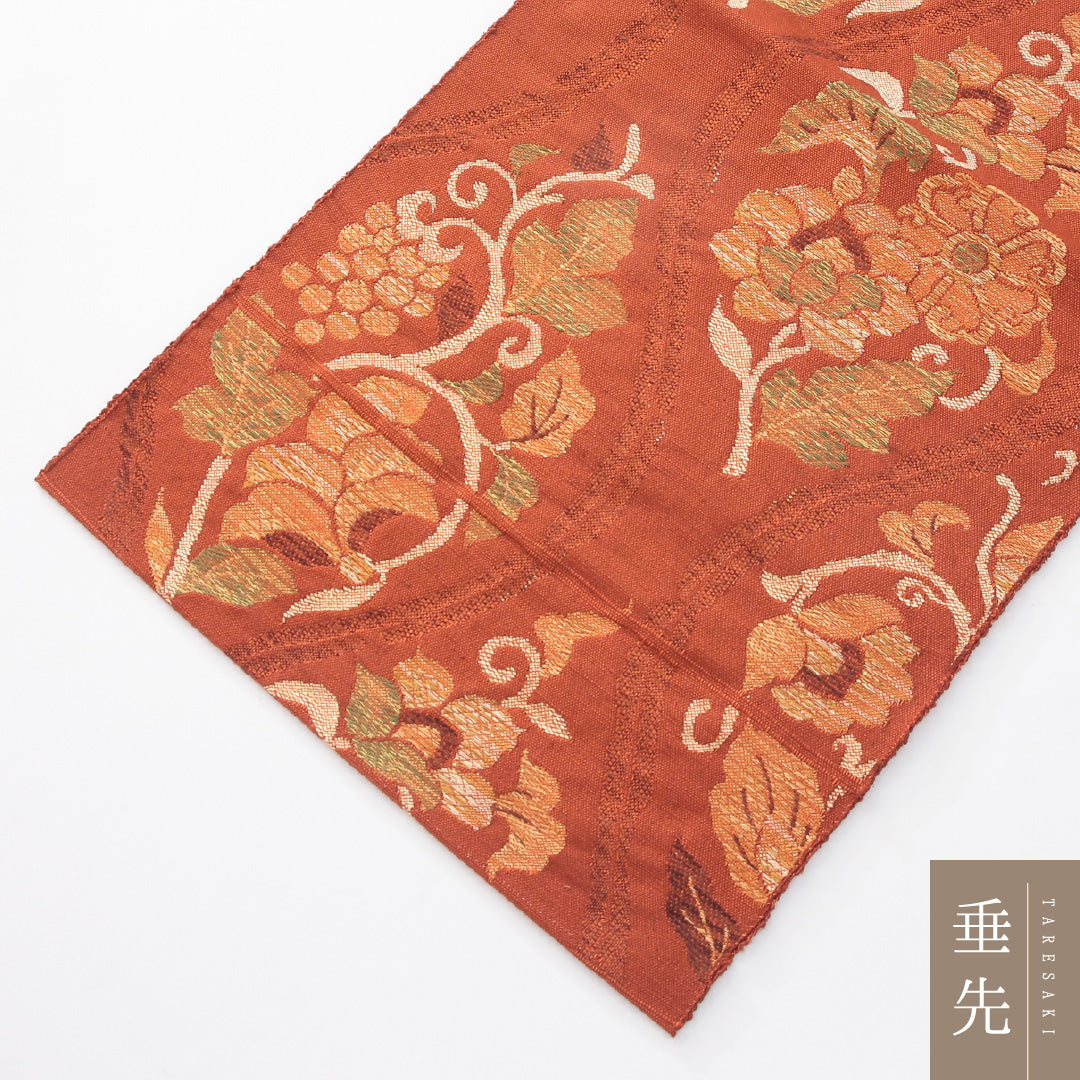 未使用品 九寸名古屋帯 Nランク 帯丈344cm 正絹 六通 名古屋仕立て 織り カジュアル 紬 葡萄唐草文 立涌 朱系 HP 1245-04147
