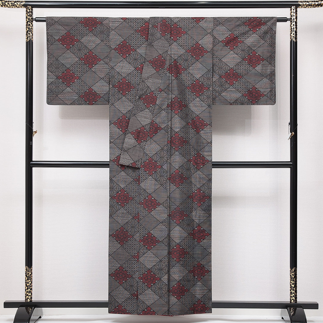 大島紬 袷 身丈157cm 裄丈64cm 正絹 Aランク インフォーマル 広衿 Mサイズ 花菱 麻の葉 黒系 RP 1223-15023