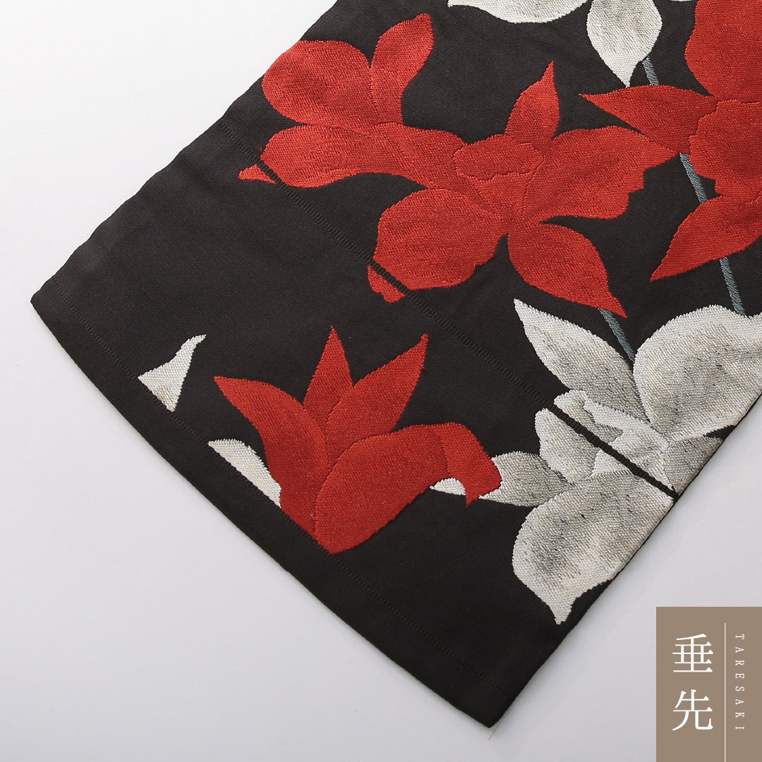 九寸名古屋帯 帯丈359cm カジュアル 名古屋仕立て 六通 Cランク 正絹 綴れ織 百合 黒系 1224-03822