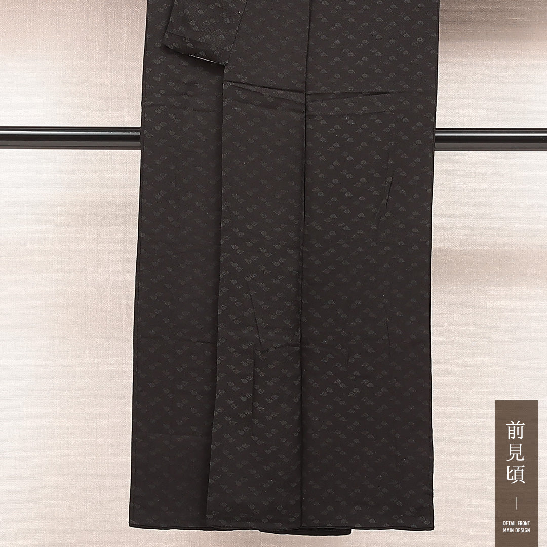 アンティーク 色無地 袷 身丈139cm 裄丈63cm 正絹 Dランク 一つ紋 (揚羽蝶) 紋意匠 (紗綾形と五三桐) 広衿 XSサイズ 黒系 RP 1219-16874