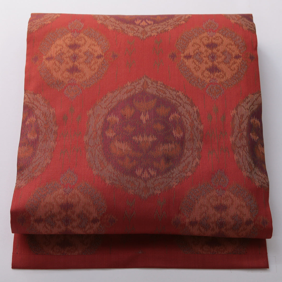 九寸名古屋帯 帯丈357cm カジュアル 名古屋仕立て 六通 Aランク 正絹 創作柄 赤系 朱系 1224-03501