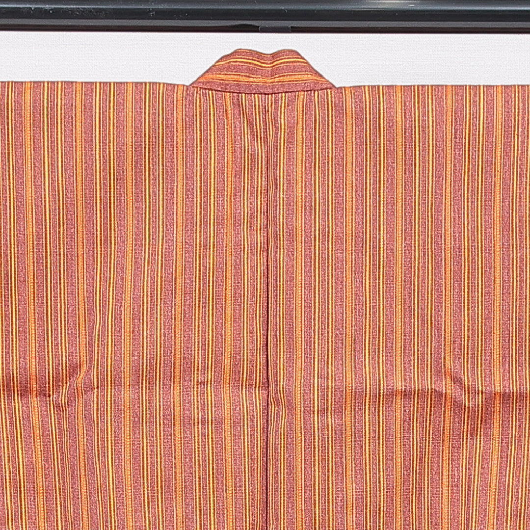 ウールの道中着(紬) 洗える着物 単衣 身丈69cm 裄丈66cm ウール Sランク Mサイズ カジュアル 縞 朱系 1264-16816