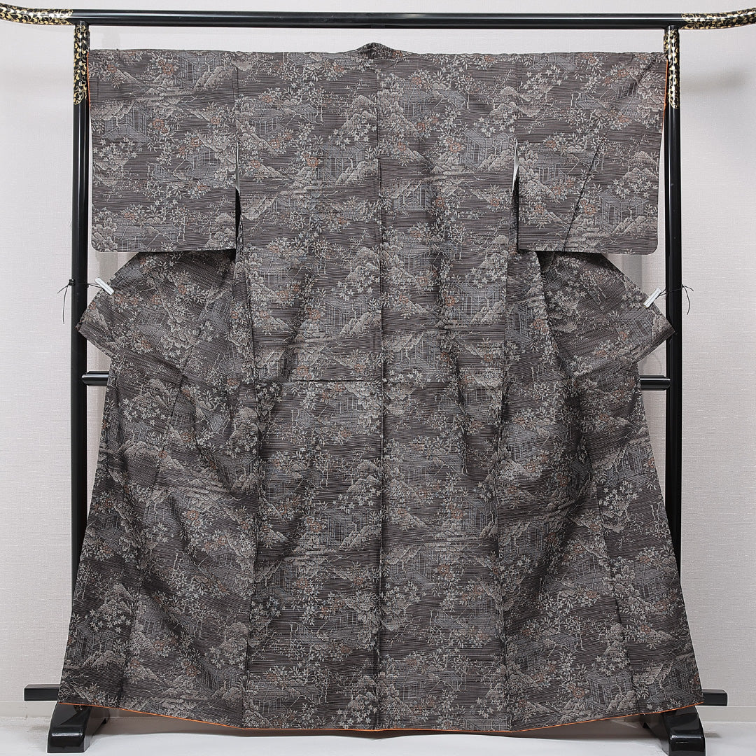 紬(大島紬) 袷 身丈164cm 裄丈69cm 正絹 Cランク Lサイズ 広衿 インフォーマル 経緯絣 茶屋辻 茶系 1216-15668