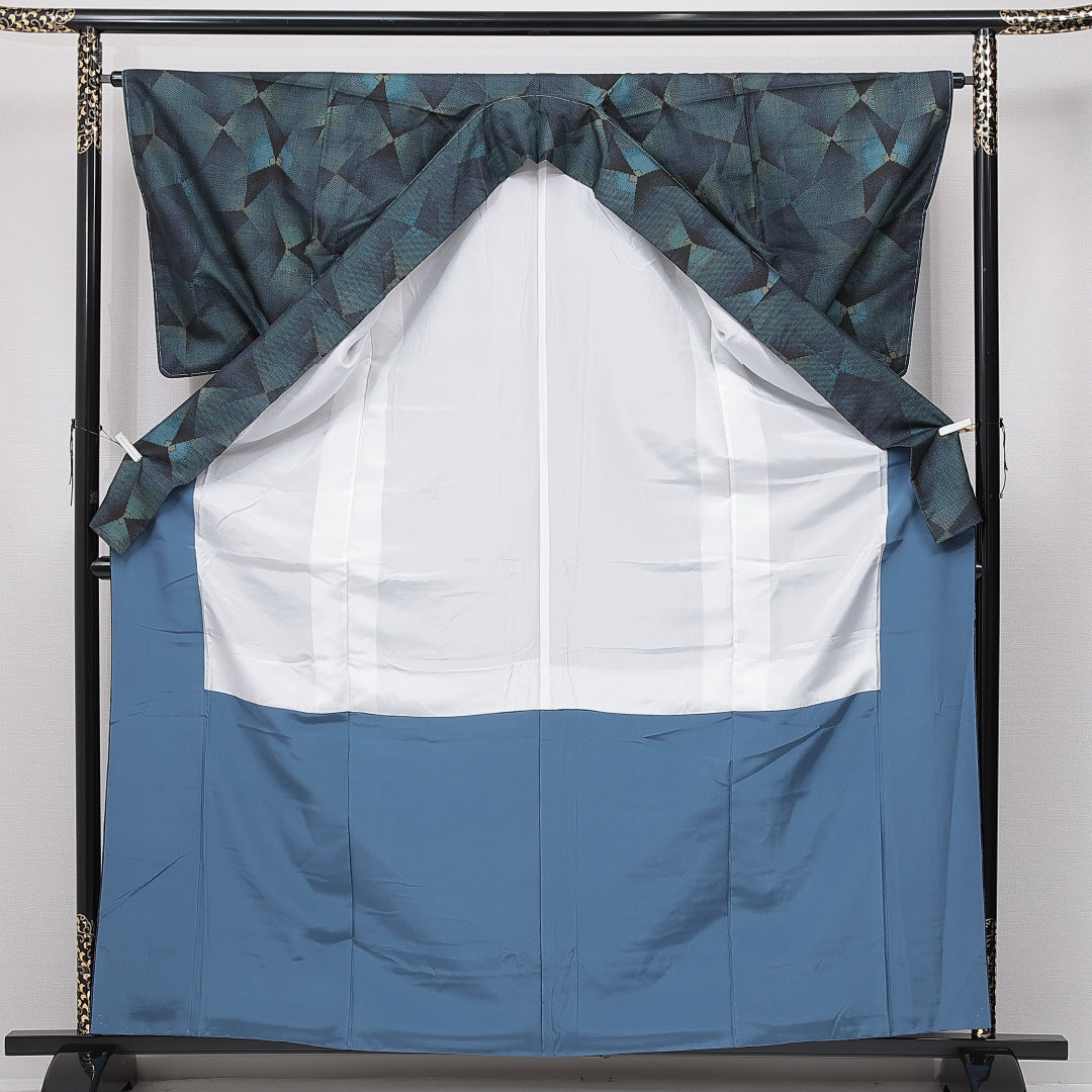 未使用品 大島紬 袷 身丈164cm 裄丈65cm 正絹 Nランク インフォーマル 広衿 Lサイズ 経緯絣 ガード加工 しつけ糸 幾何学柄 青系 PO 1223-15044