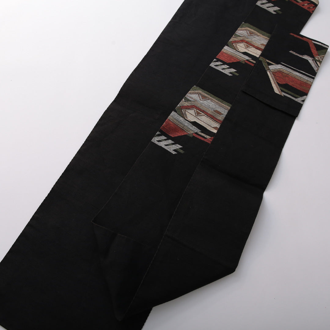 八寸名古屋帯(紬) 帯丈360cm カジュアル 名古屋仕立て 六通 帯芯なし Aランク 正絹 創作柄 黒系 1224-03504