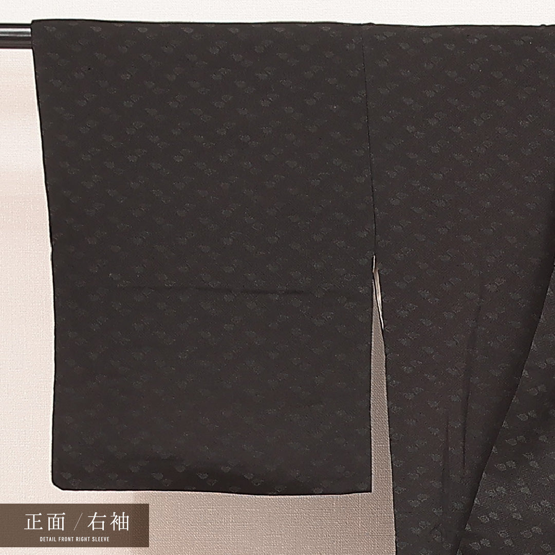 アンティーク 色無地 袷 身丈139cm 裄丈63cm 正絹 Dランク 一つ紋 (揚羽蝶) 紋意匠 (紗綾形と五三桐) 広衿 XSサイズ 黒系 RP 1219-16874
