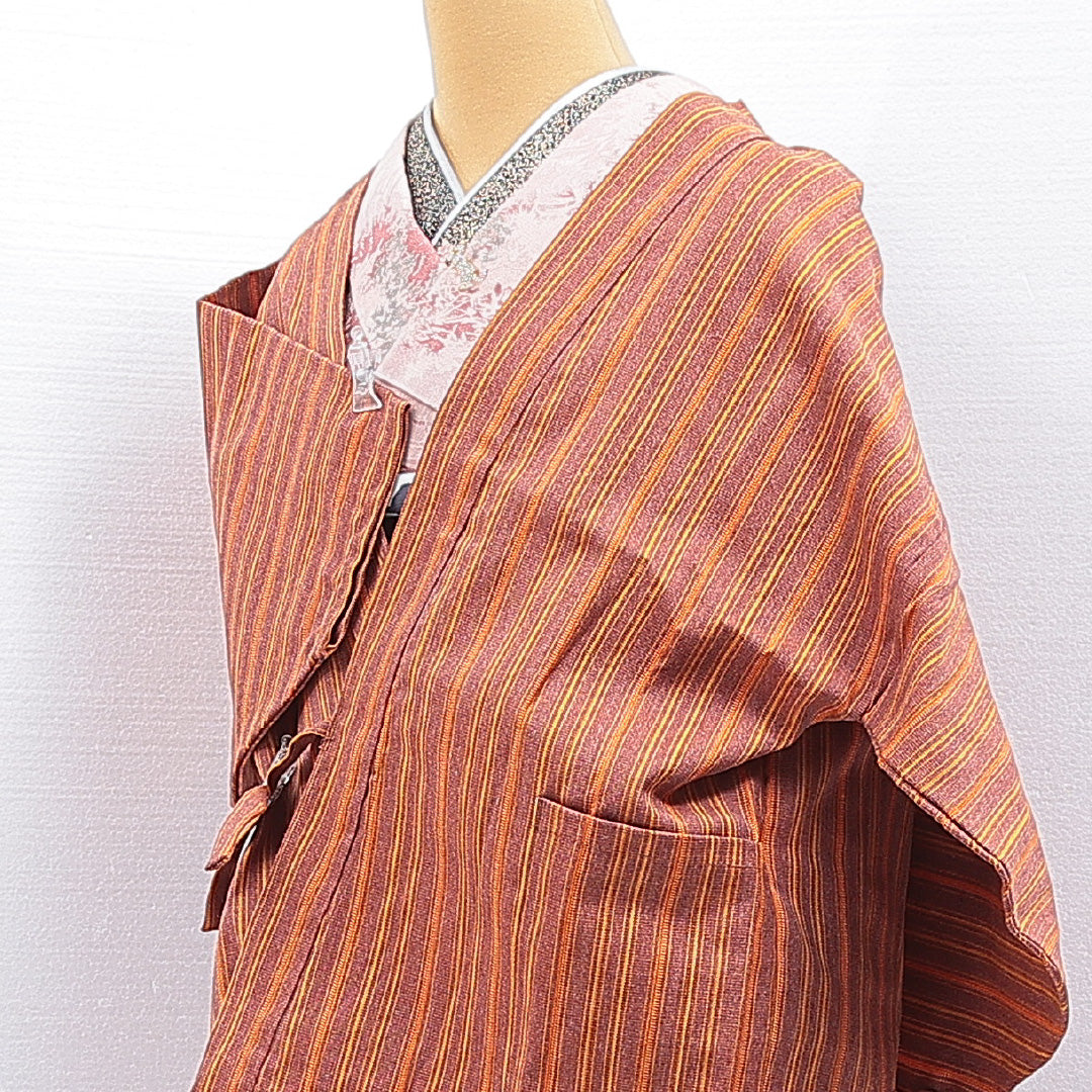 ウールの道中着(紬) 洗える着物 単衣 身丈69cm 裄丈66cm ウール Sランク Mサイズ カジュアル 縞 朱系 1264-16816