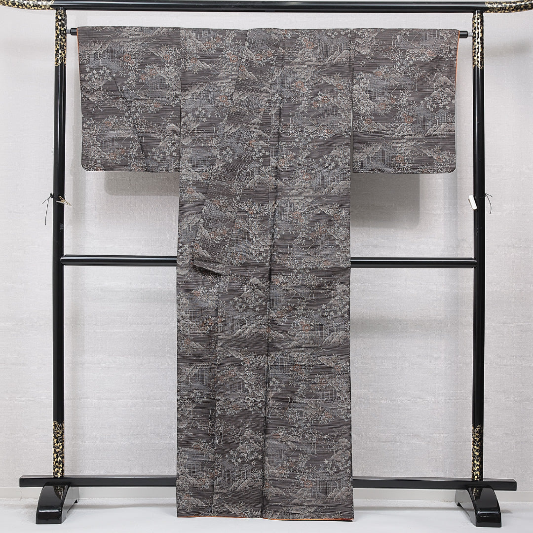 紬(大島紬) 袷 身丈164cm 裄丈69cm 正絹 Cランク Lサイズ 広衿 インフォーマル 経緯絣 茶屋辻 茶系 1216-15668