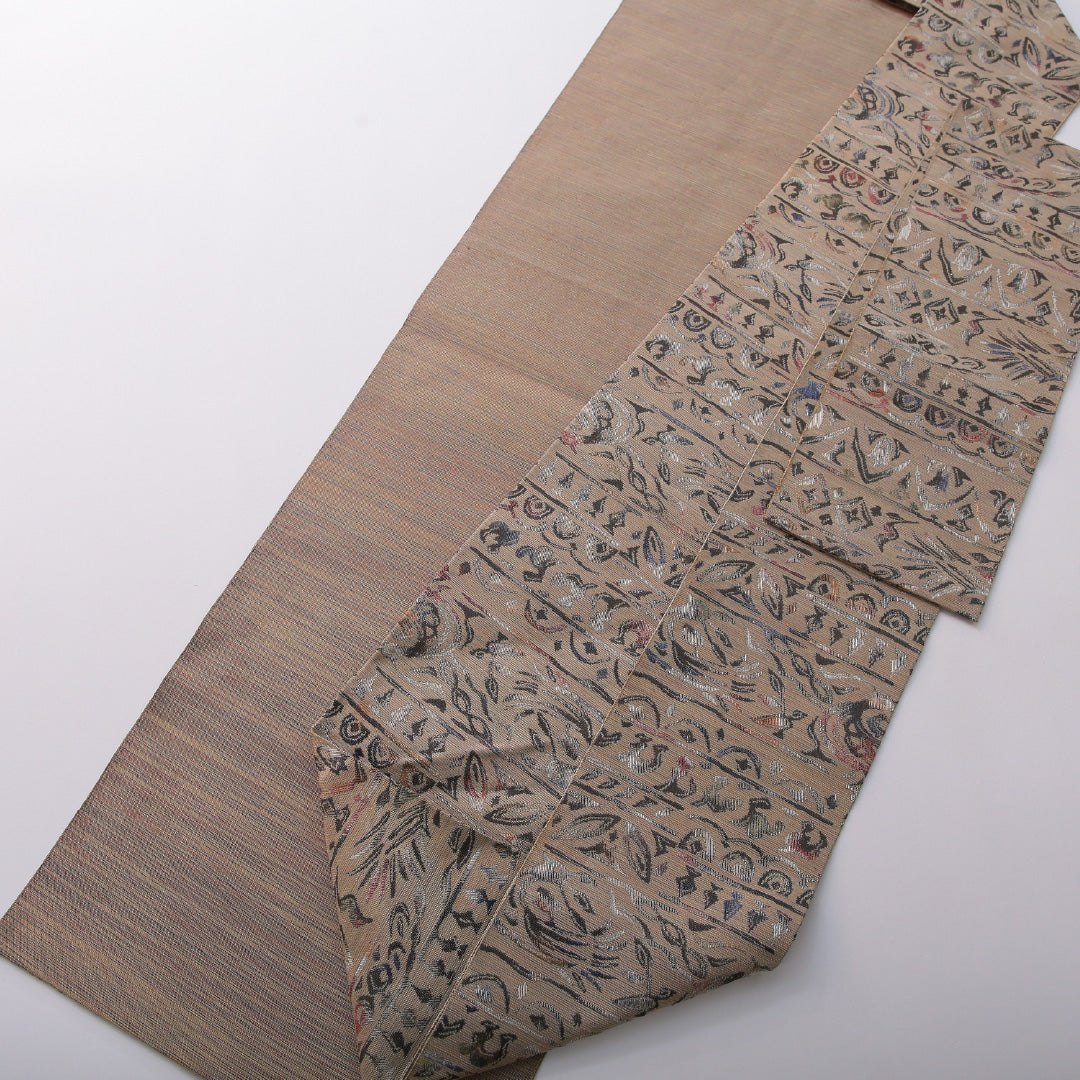 八寸名古屋帯 帯丈357cm カジュアル 名古屋仕立て 六通 帯芯なし Cランク 正絹 創作柄 ベージュ系 1224-03541