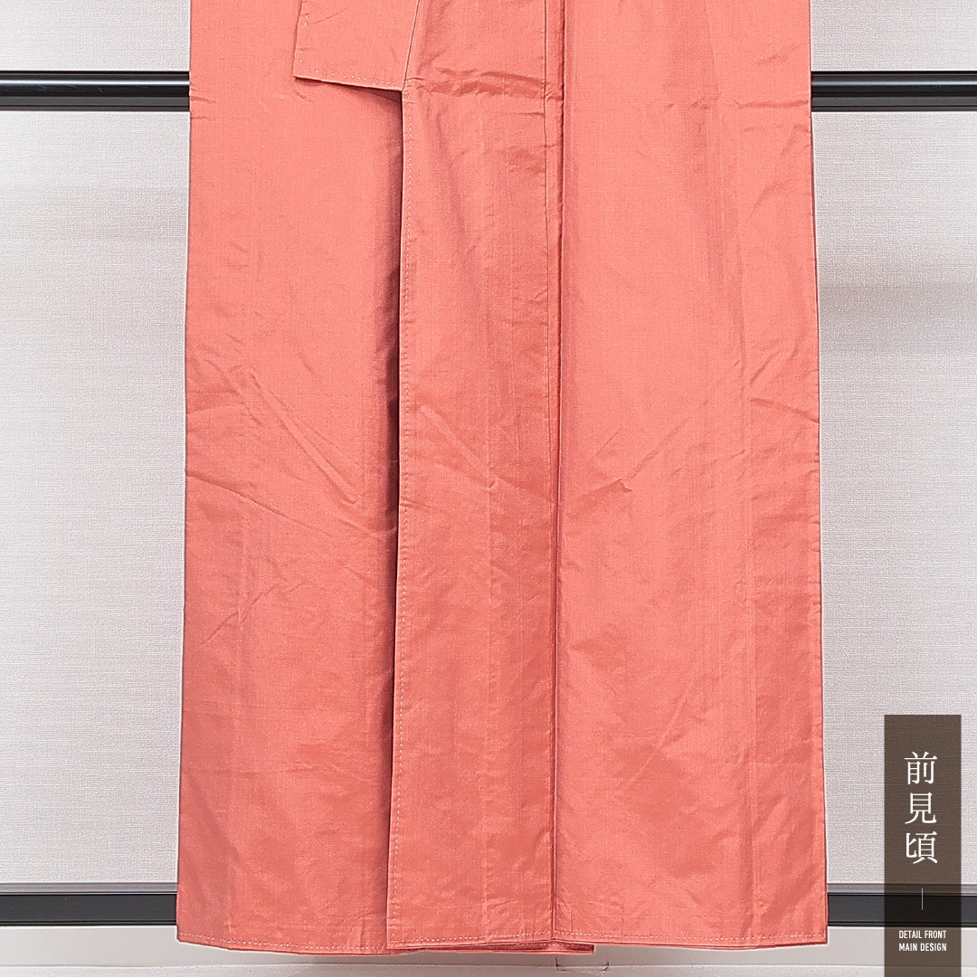 未使用品 紬 袷 身丈155cm 裄丈65cm 正絹 Nランク カジュアル 広衿 Mサイズ しつけ糸 無地 朱系 RP 1223-15111