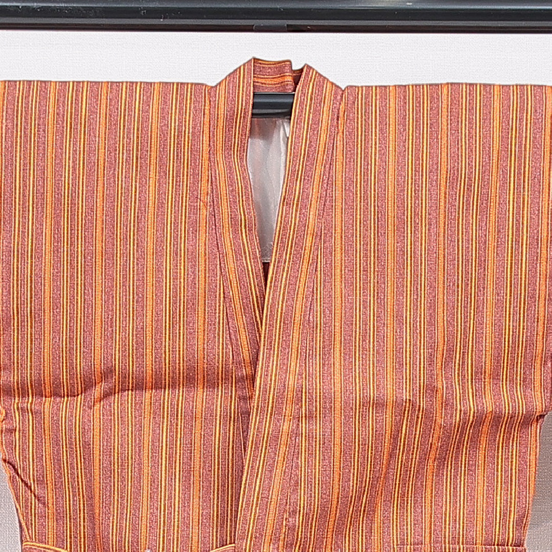 ウールの道中着(紬) 洗える着物 単衣 身丈69cm 裄丈66cm ウール Sランク Mサイズ カジュアル 縞 朱系 1264-16816