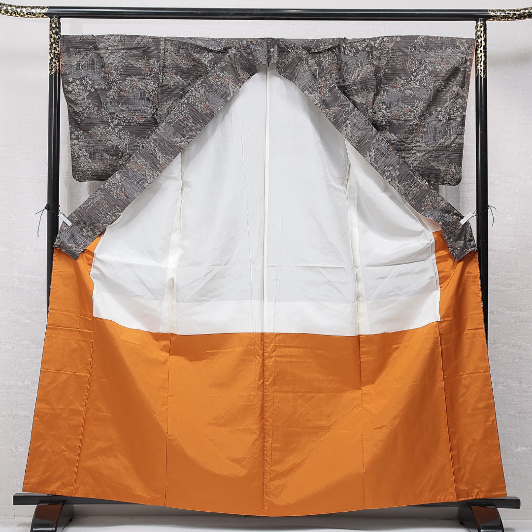 紬(大島紬) 袷 身丈164cm 裄丈69cm 正絹 Cランク Lサイズ 広衿 インフォーマル 経緯絣 茶屋辻 茶系 1216-15668