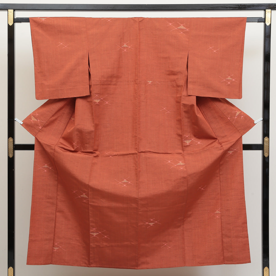 紬 単衣 身丈153cm 裄丈62cm 正絹 Aランク カジュアル 広衿 Sサイズ 創作柄 朱系 HP 1223-02784