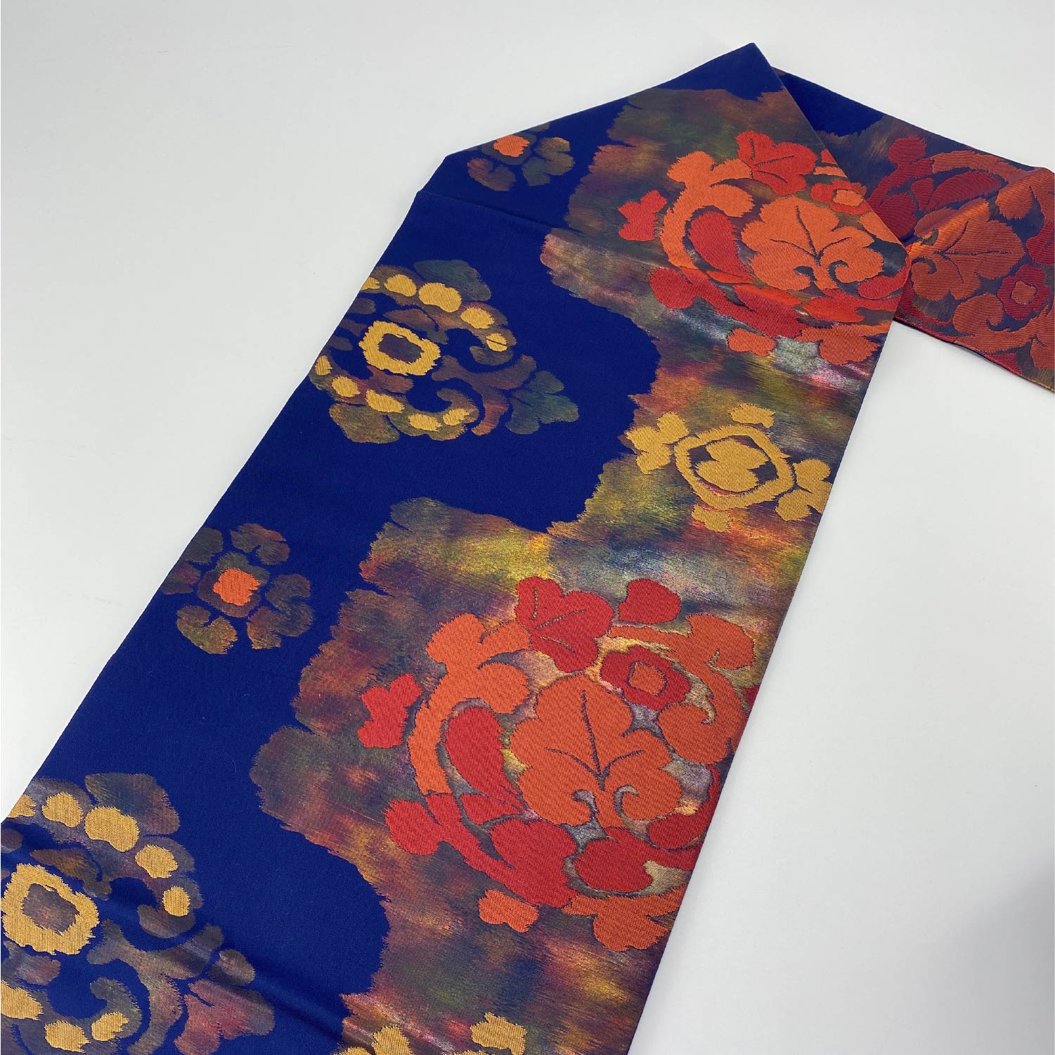 名古屋帯 帯丈323cm 六通 名古屋仕立て Sランク カジュアル 引箔 宝相華 正絹 紺系 1224-00022