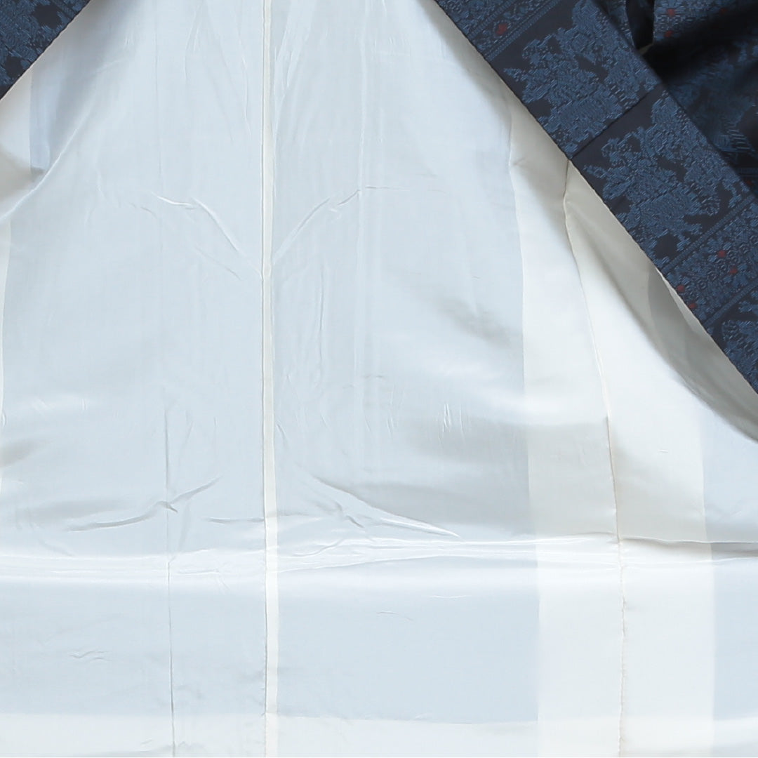 紬(大島紬) 袷 身丈153cm 裄丈64cm 正絹 Sランク Sサイズ 広衿 インフォーマル 緯総絣 コプト柄 紺系 1216-02699