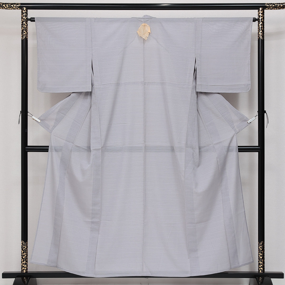 未使用品 色無地 絽 身丈156cm 裄丈62cm Nランク 正絹 広衿 Mサイズ 一つ紋 セミフォーマル 地紋なし しつけ糸 無地 上品 しとやか グレー系 1214-14383