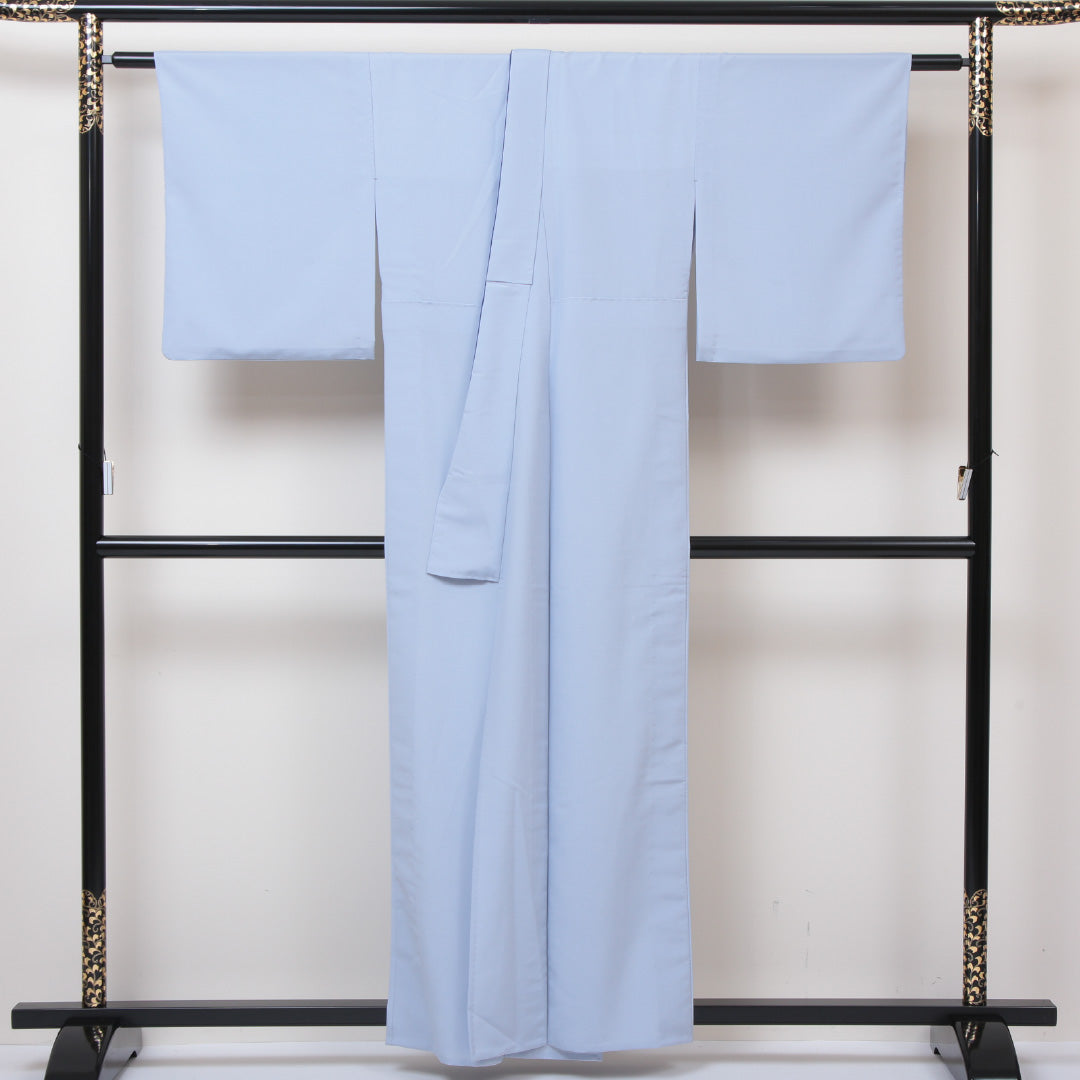 色無地 洗える着物 単衣 身丈157cm 裄丈66cm ポリエステル Aランク Mサイズ バチ衿 一つ紋（丸に覗き菊） セミフォーマル 肩当て 無地 水色系 1214-05069