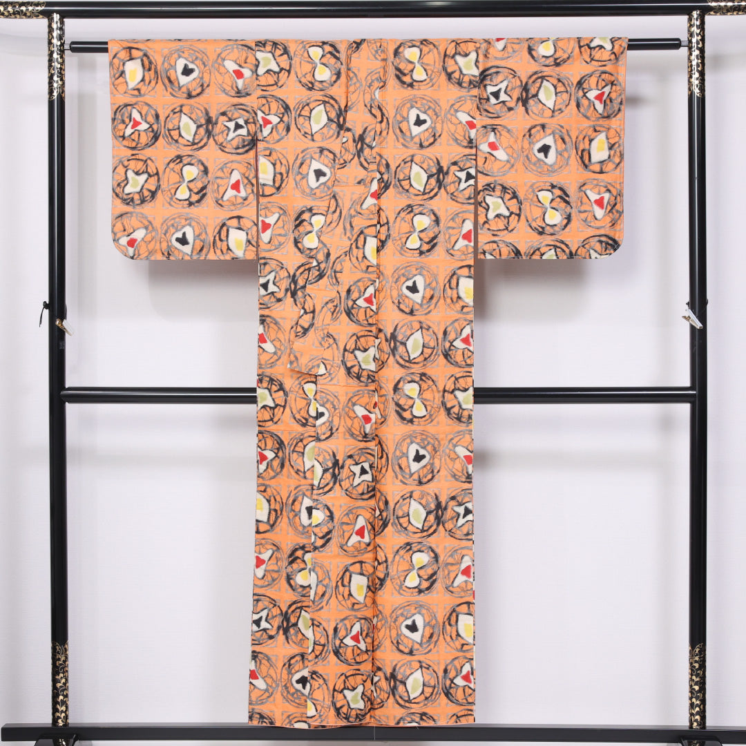 アンティーク 銘仙の着物 袷 身丈148cm 裄丈61cm 正絹 Aランク バチ衿 XSサイズ 抽象柄 朱系 M4 1223-11462
