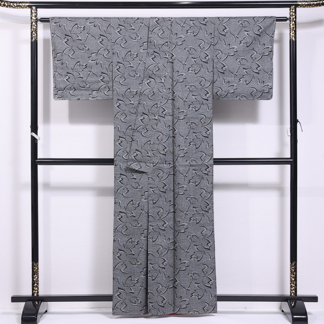 未使用品 本場大島紬 袷 身丈160cm 裄丈64cm 正絹 Nランク インフォーマル 広衿 Lサイズ しつけ糸 植物柄 グレー系 PO 1223-11633